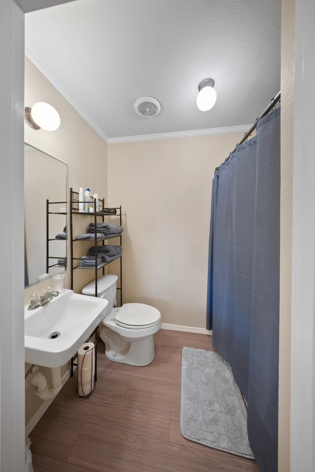 Cypress bathroom with vanity, toilet and shower